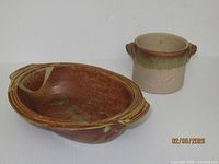 Both pottery pieces side by side