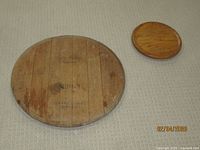 Large and small wooden Lazy Susans side by side