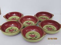 Six Magnolia pattern soup bowls top view showing floral interior