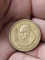 Obverse of 1989 1000 pesos coin showing denomination, date, Juana de Asbaje portrait, Mo mintmark
