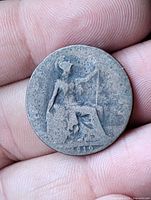 Reverse showing seated Britannia and date