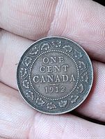 Reverse view showing denomination, country and date