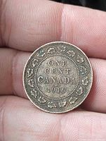 Reverse showing ONE CENT CANADA 1916 within maple leaf wreath