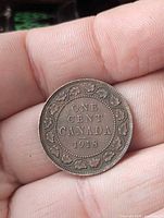 Reverse side showing ONE CENT CANADA 1918 and maple leaf wreath