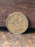 Reverse showing 'THREE PENCE 1941' and crowned thrift plant