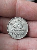 Reverse of 1942 Canadian 5-cent coin showing beaver design and date