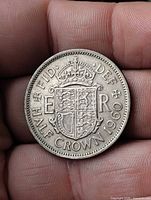 Reverse showing crowned shield, legends FID DEF ER HALF CROWN 1960