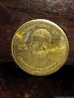 Obverse showing Owen Nolan portrait and bilingual Canadian Olympic Team legend