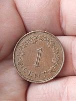 Obverse side showing 1 CENT and wreath