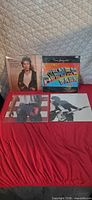 All four Bruce Springsteen albums displayed front covers