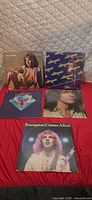 All five Peter Frampton album covers displayed