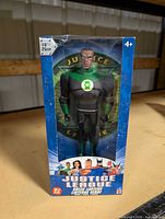 Front view of boxed Green Lantern figure