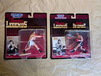 Front view of two sealed Starting Lineup Timeless Legends boxing figures, Rocky Marciano and Joe Louis