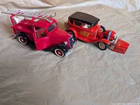 Both diecast vehicles side by side showing overall condition and scale