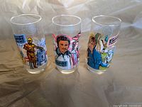 Front view of three Empire Strikes Back promotional glasses showing character graphics