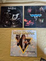 Front jackets of all three albums