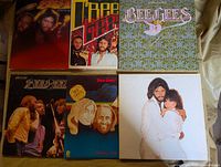 Front covers of all six albums arranged in two rows