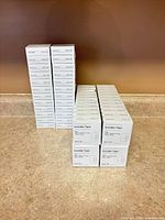 Stacked boxes of Baseline invisible tape illustrating total quantity and sealed condition