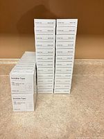 Stacked cartons of Baseline invisible tape