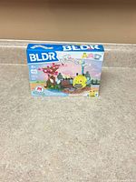 Front view of sealed BLDR Sunny's Park Life Squishmallows building set box