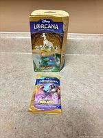 Front view of sealed starter deck box and separate booster pack