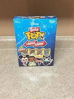 Front of sealed Funko Bitty Pop! Chase Game box