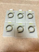 Six sealed heyday cable boxes arranged together