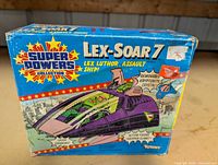 Front panel of Super Powers Lex-Soar 7 box showing artwork and product name
