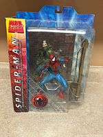 Front view of sealed Marvel Select Spider-Man figure and accessories in blister packaging