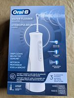 Front of sealed Oral-B Water Flosser Advanced retail box