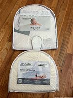 Both sealed bassinet wedges front view