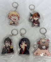 All five individually wrapped keychains displayed
