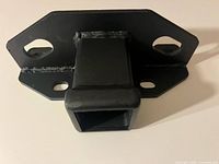 Front angled view showing square receiver tube and mounting plate
