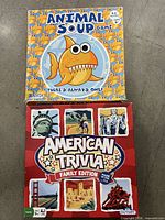 Top-down shot of both board game boxes