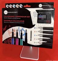Front of sealed Manuscript Calligraphy Compendium Set box showing brand, product name, pen colours and nib sizes