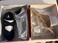 Both pairs new in their boxes