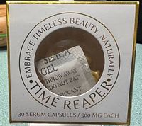Front view of sealed Santis Time Reaper box showing capsule window and labeling