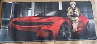 Full view of desk mat showing anime graphic and size