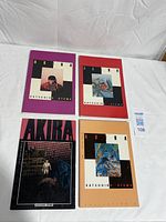 All four Akira comic books front covers visible