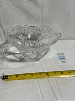 Oblique view showing bowl profile, tape measure indicates diameter