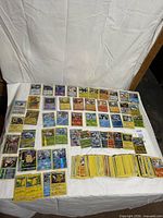 Tabletop layout showing foil/rare cards and bulk stack