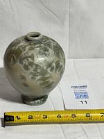 Vase full view with measuring tape showing scale
