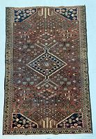 Full view of rug front side showing pattern and borders