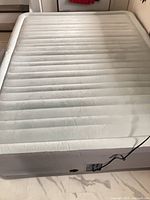 Top view of inflated gray queen air mattress