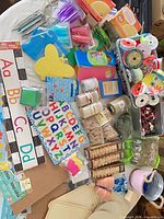 overview of assorted craft supplies on table