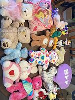 Overview of all plush items laid out on table