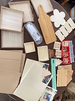 overview showing trays, boards, boxes, sign, pallets, flower blank, stamps, cardstock, plastic sheets
