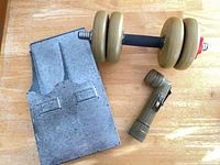 All three items: adjustable dumbbell, angle flashlight, galvanized steel wall bracket