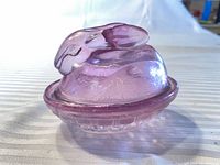 Overall view of assembled amethyst glass candy dish with rabbit lid