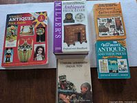 Front covers of all five books showing titles and cover art